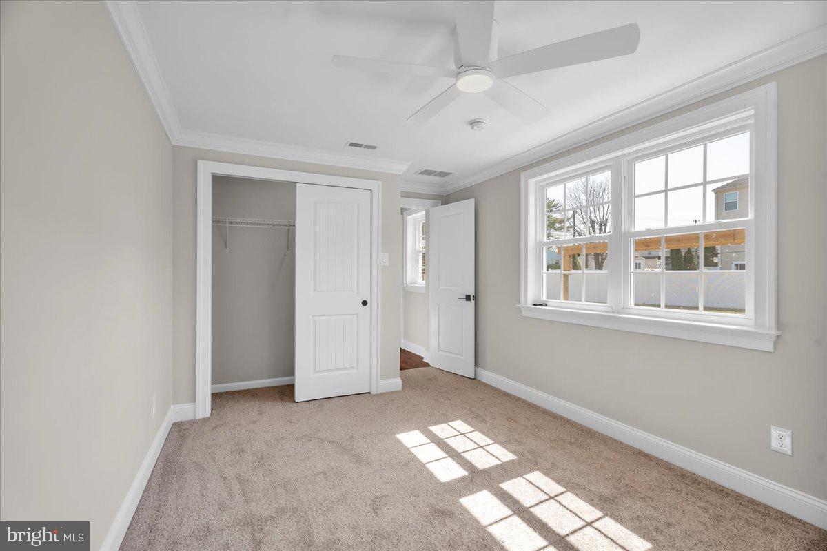 101 Center Avenue Mount Ephraim, NJ 08059 - Photo 19 of 42 a view of an empty room with a window