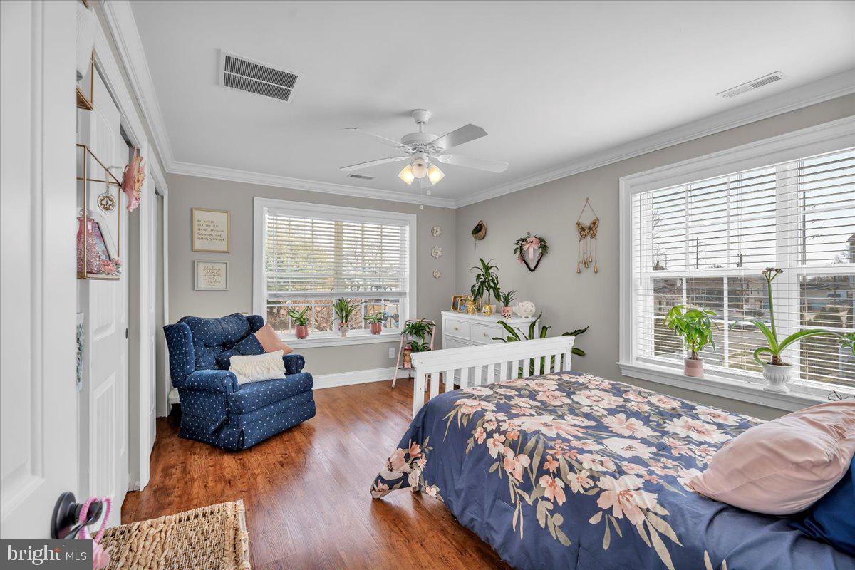 101 Center Avenue Mount Ephraim, NJ 08059 - Photo 29 of 42 a bedroom with furniture and a large window