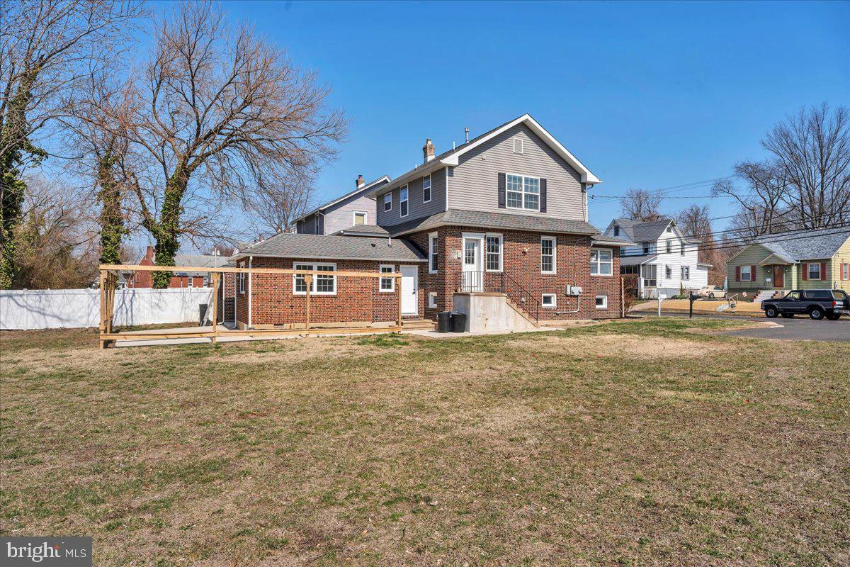 101 Center Avenue Mount Ephraim, NJ 08059 - Photo 33 of 42 a front view of a house with a yard