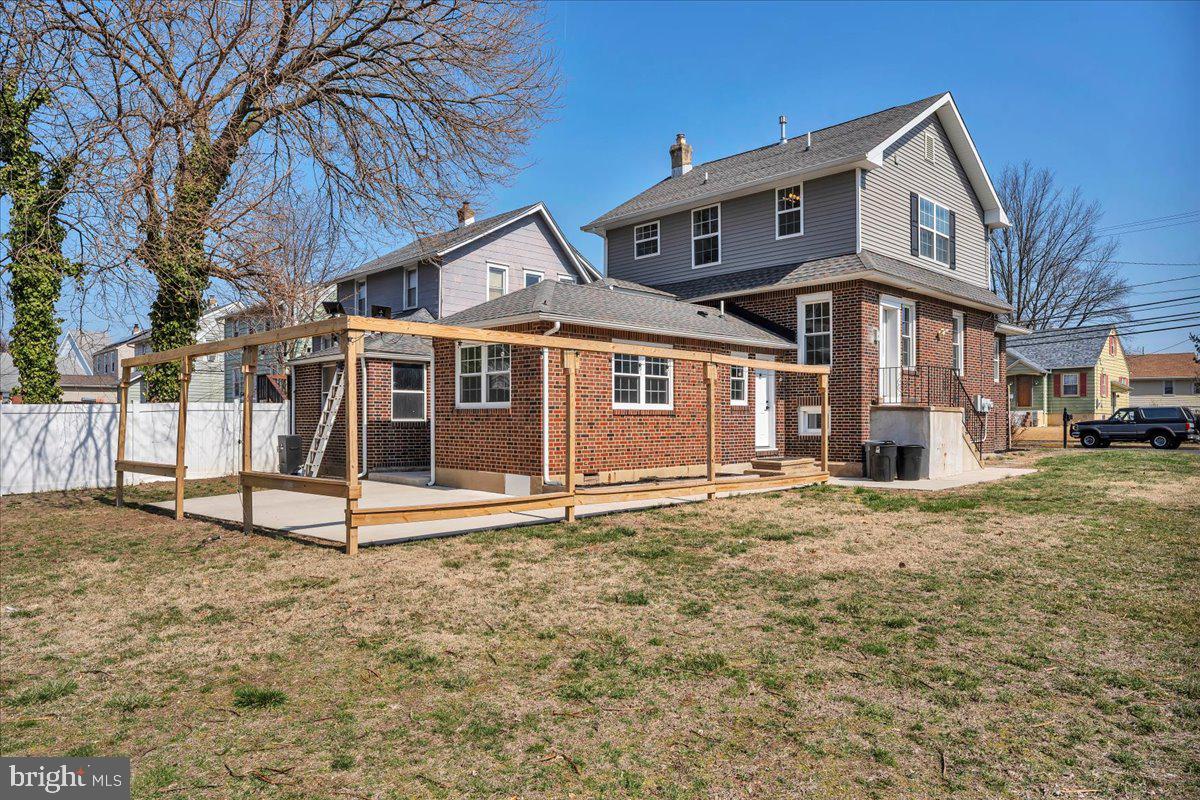 101 Center Avenue Mount Ephraim, NJ 08059 - Photo 35 of 42 a front view of a house with a garden