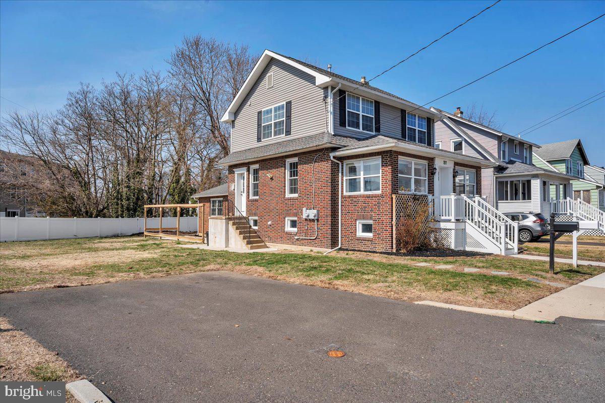 101 Center Avenue Mount Ephraim, NJ 08059 - Photo 4 of 42 a house view with a outdoor space