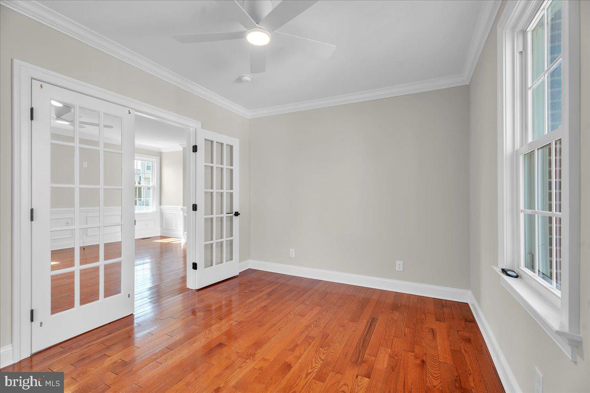 101 Center Avenue Mount Ephraim, NJ 08059 - Photo 9 of 42 wooden floor in an empty room with a window