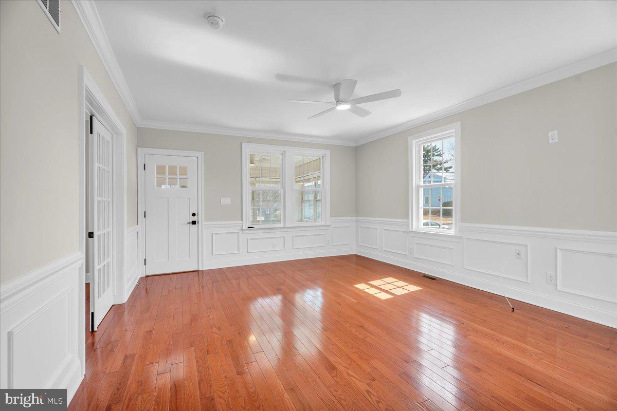 101 Center Avenue Mount Ephraim, NJ 08059 - Photo 10 of 42 wooden floor in an empty room with a window
