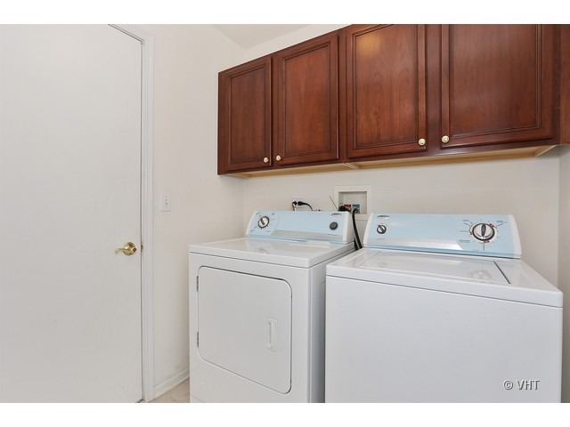 897 Havenshire Road, Unit 897 Naperville, IL 60565 - Photo 13 of 14 a utility room with dryer and washer