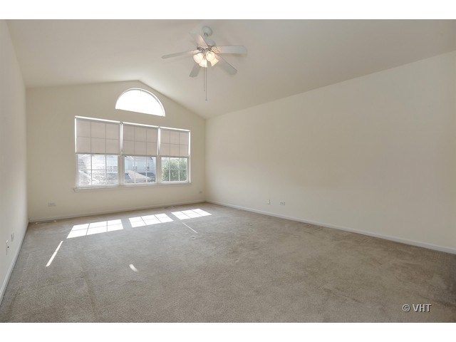897 Havenshire Road, Unit 897 Naperville, IL 60565 - Photo 9 of 14 a view of an empty room with a window