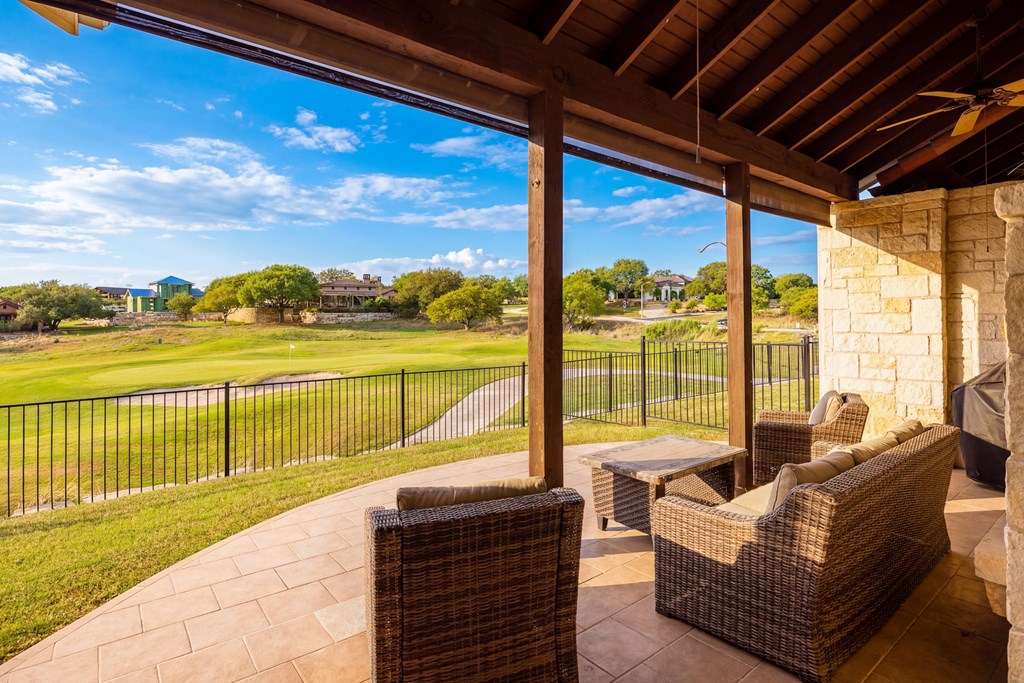 3801-16 Club House Road Kerrville, TX 78028 - Photo 17 of 22 a balcony with furniture and city view