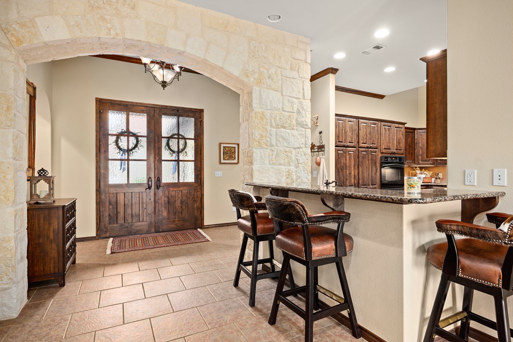 3801-16 Club House Road Kerrville, TX 78028 - Photo 3 of 22 a view of a livingroom with furniture and window
