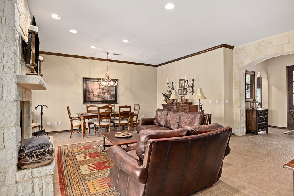 3801-16 Club House Road Kerrville, TX 78028 - Photo 9 of 22 a living room with furniture and a flat screen tv