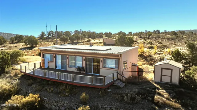 a view of a balcony with chairs