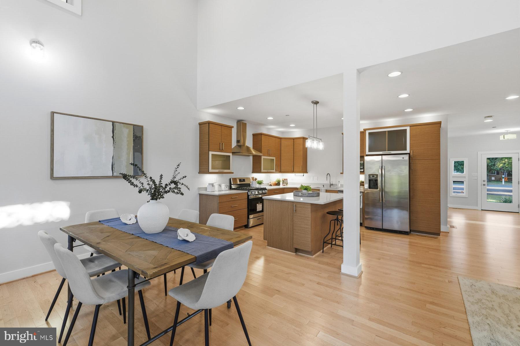 34 Johnson Road Pasadena, MD 21122 - Photo 12 of 45 a kitchen with a table and chairs in it