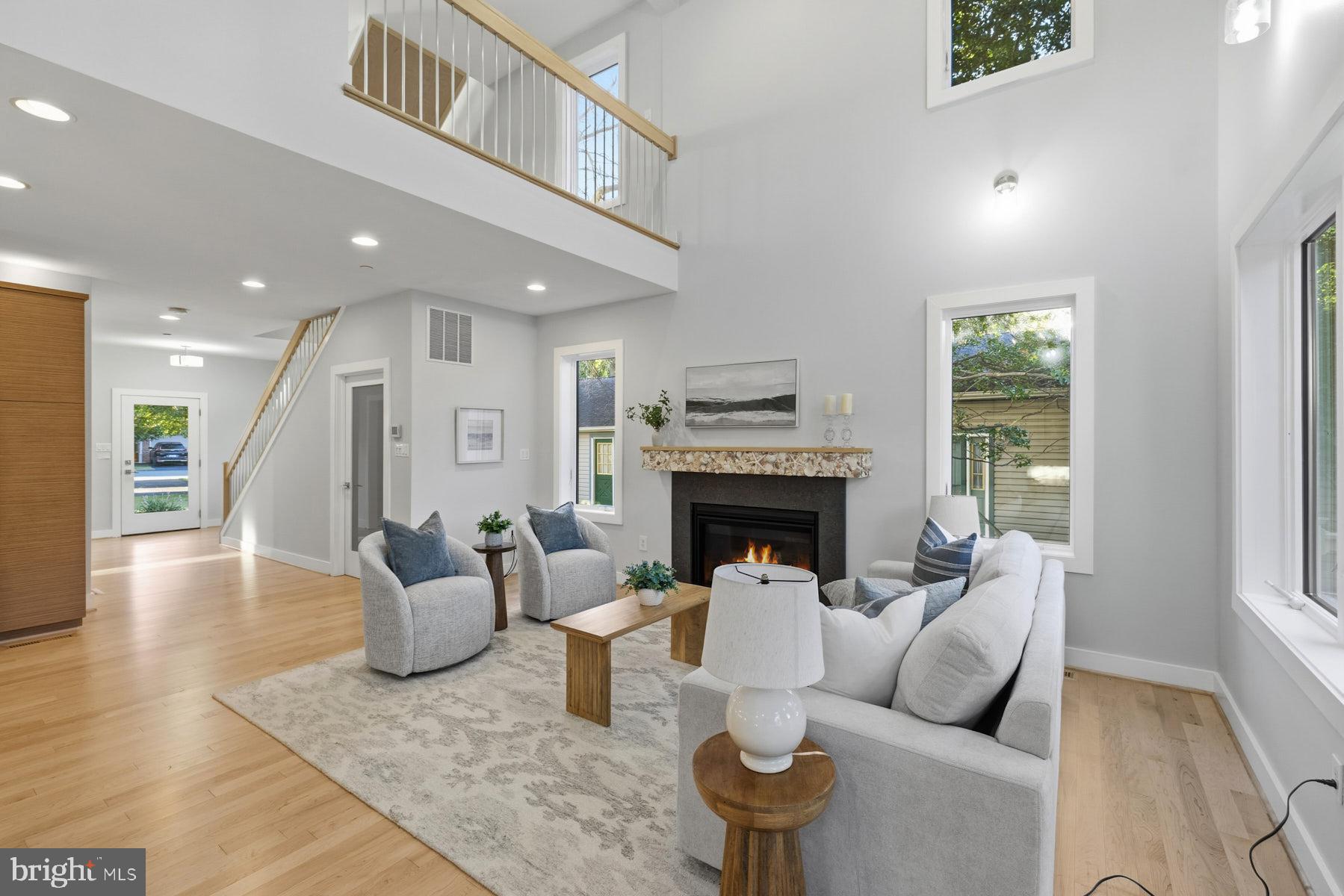 34 Johnson Road Pasadena, MD 21122 - Photo 14 of 45 a living room with furniture and a fireplace