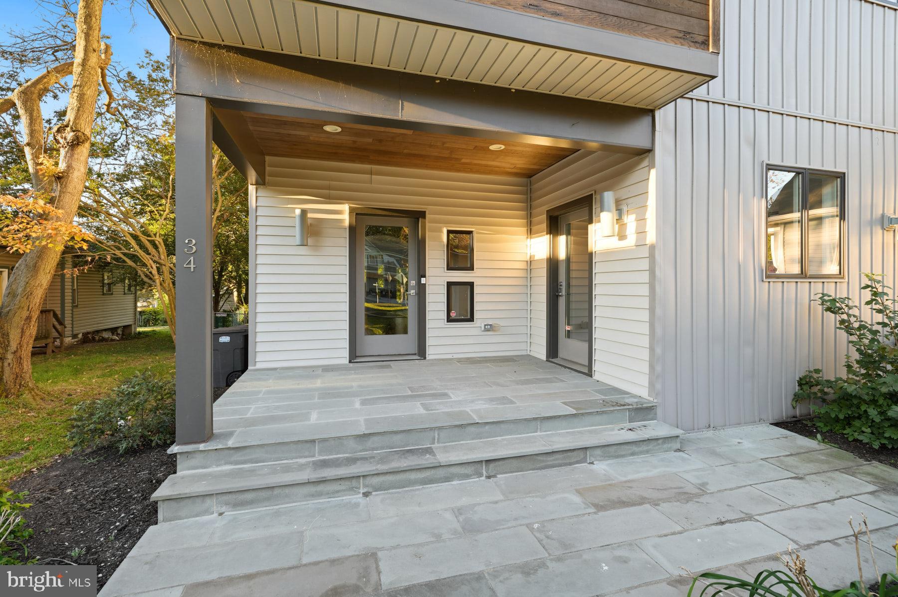 34 Johnson Road Pasadena, MD 21122 - Photo 2 of 45 a view of a house with a porch