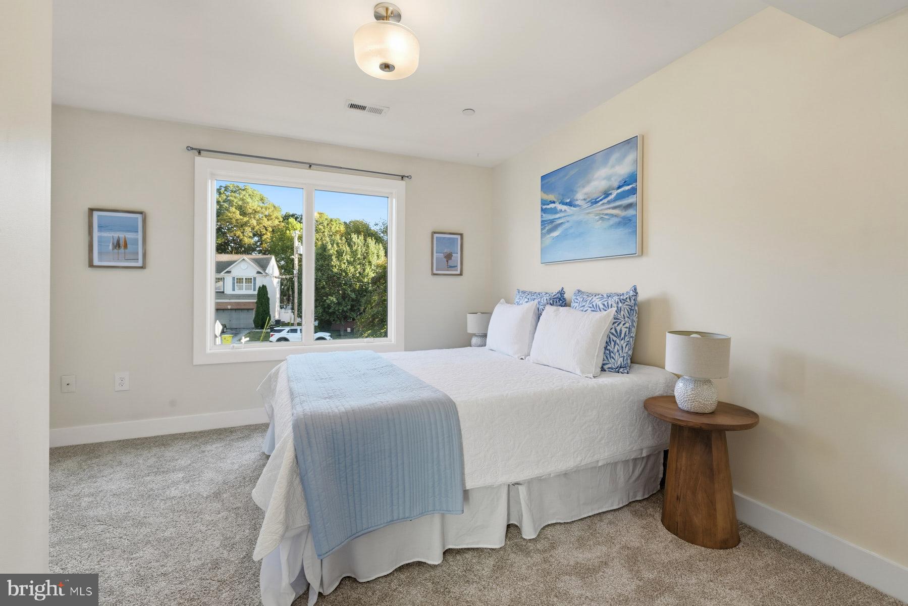 34 Johnson Road Pasadena, MD 21122 - Photo 34 of 45 a bedroom with a bed and a painting on the wall