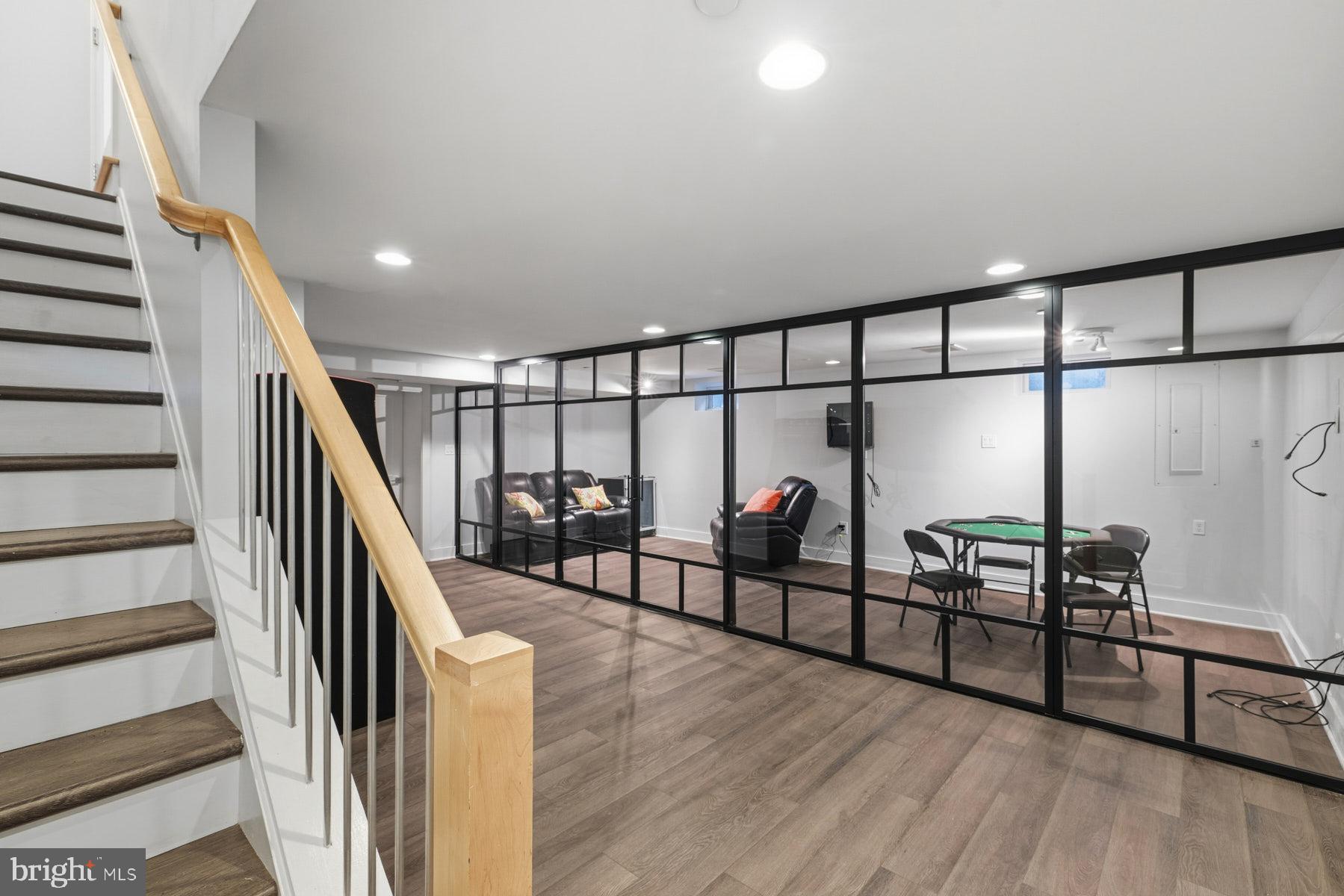 34 Johnson Road Pasadena, MD 21122 - Photo 37 of 45 a view of a hallway with wooden floor and stairs