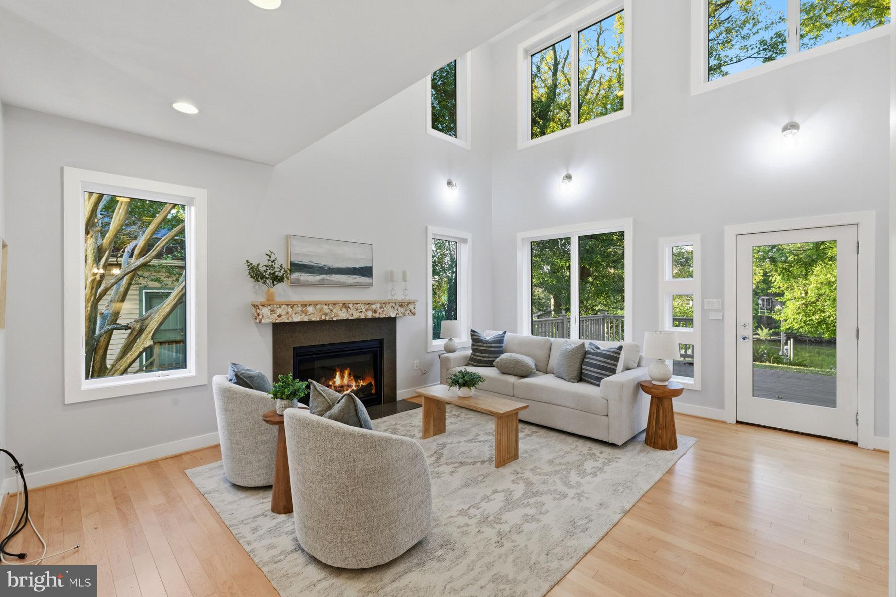34 Johnson Road Pasadena, MD 21122 - Photo 6 of 45 a living room with furniture and a fireplace