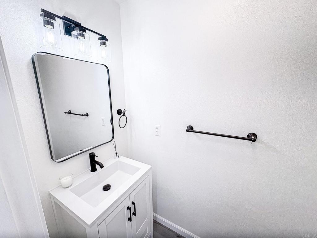 3005 Litt Road Modesto, CA 95355 - Photo 26 of 53 a bathroom with a sink and mirror