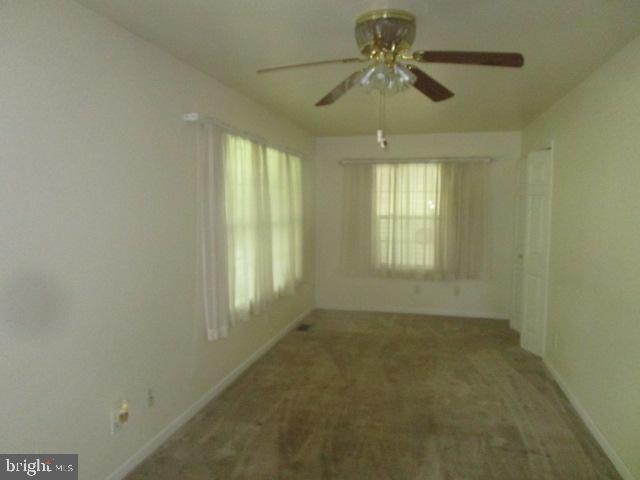 551 Post Road Rising Sun, MD 21911 - Photo 3 of 6 a view of an empty room with a window