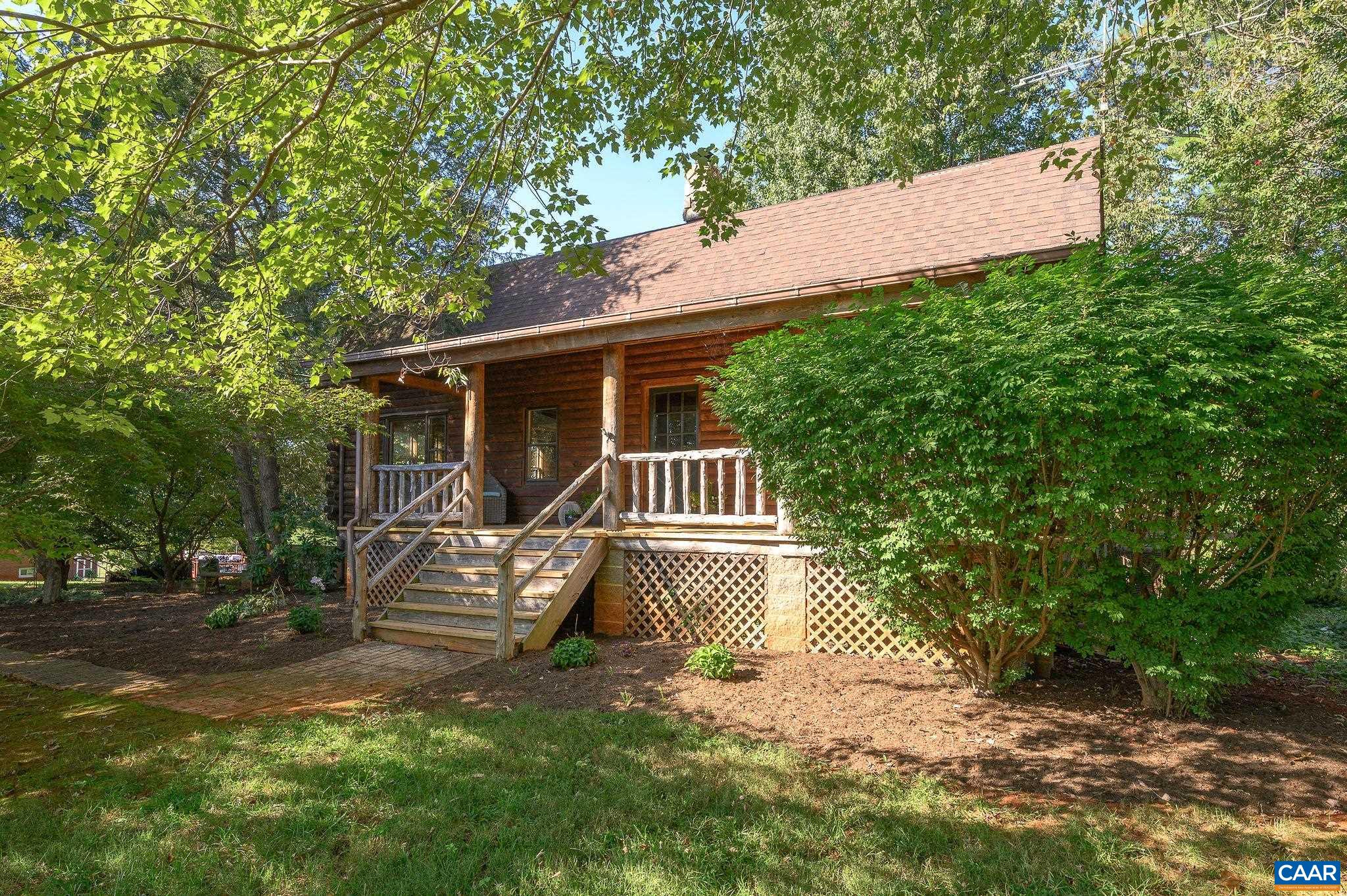 3946 Rock Branch Road North Garden, VA 22959 - Photo 2 of 36 a front view of a house with a yard