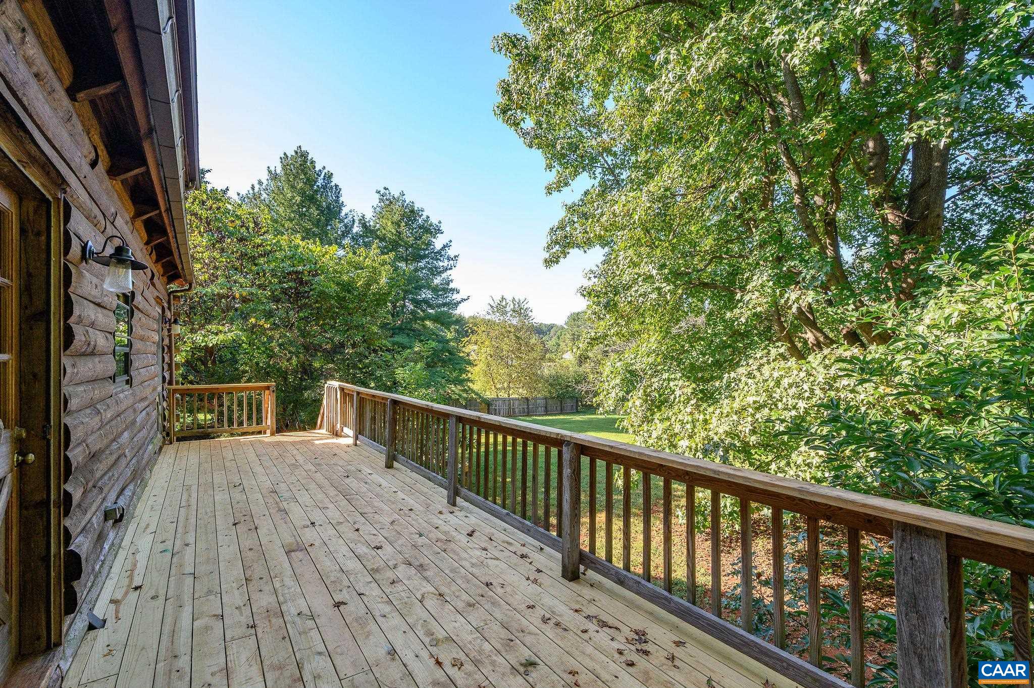 3946 Rock Branch Road North Garden, VA 22959 - Photo 31 of 36 a view of balcony with wooden floor and fence
