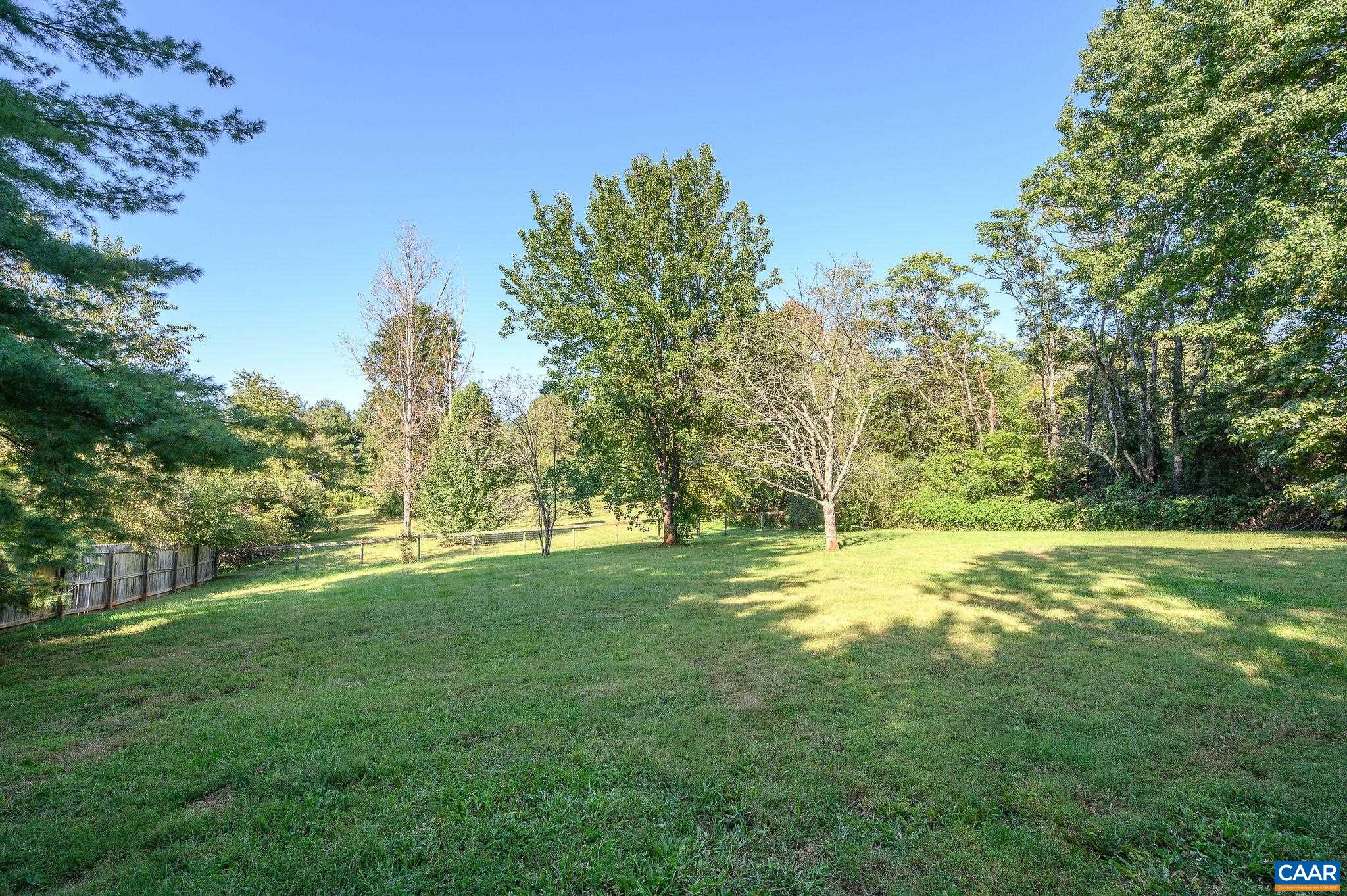 3946 Rock Branch Road North Garden, VA 22959 - Photo 32 of 36 a view of a big yard with large trees
