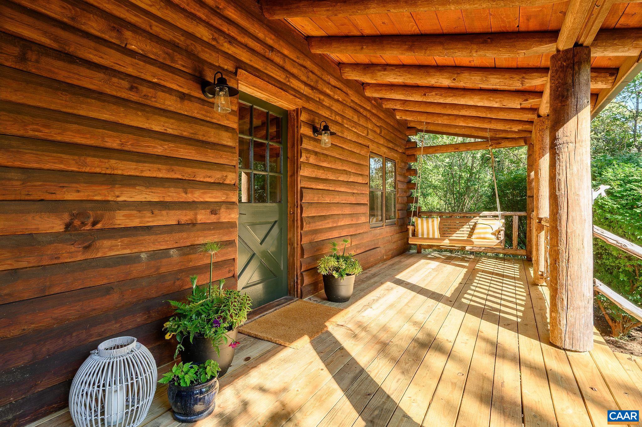 3946 Rock Branch Road North Garden, VA 22959 - Photo 7 of 36 a view of a porch with seating space