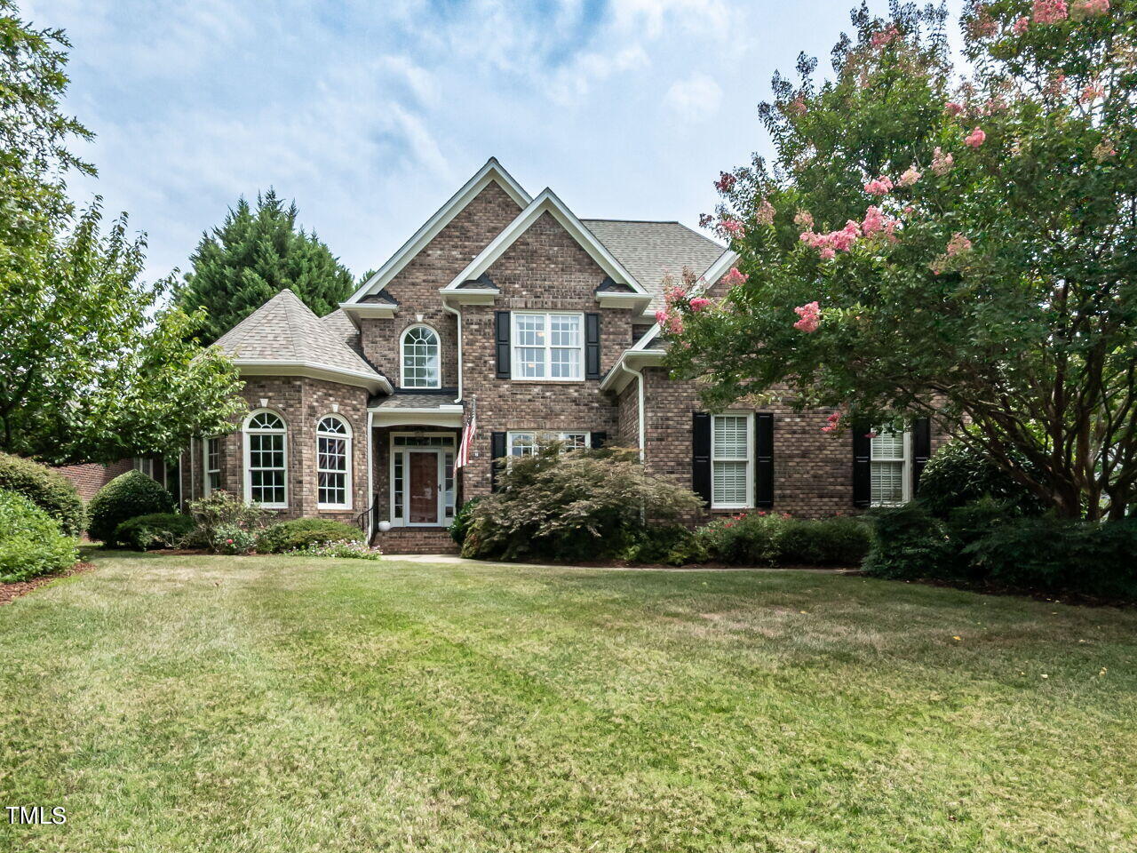 119 Oldefield Lane Garner, NC 27529 - Photo 1 of 38 a front view of a house with a yard