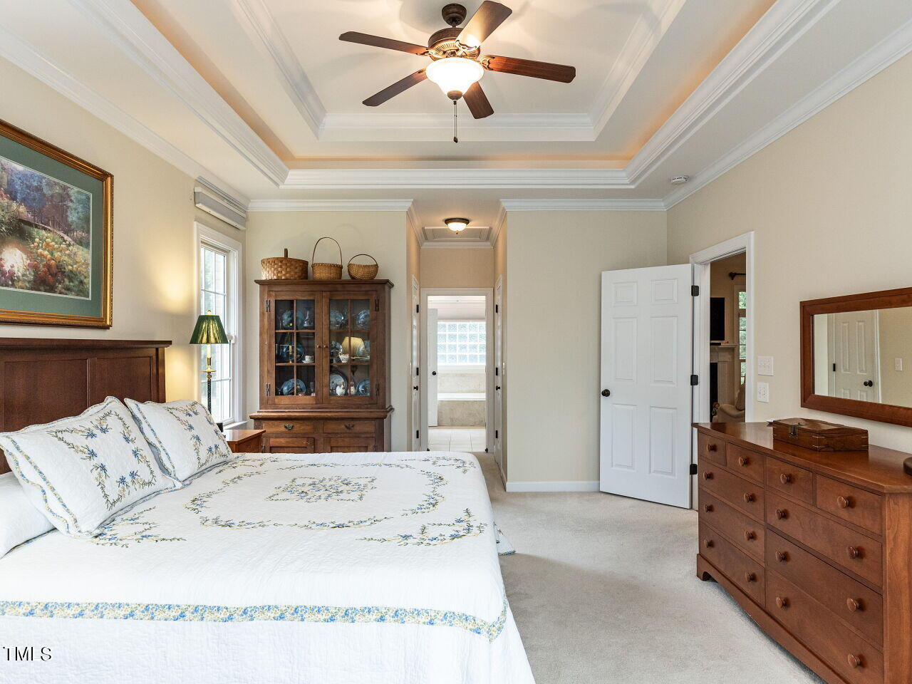 119 Oldefield Lane Garner, NC 27529 - Photo 16 of 38 a living room with furniture and a bed