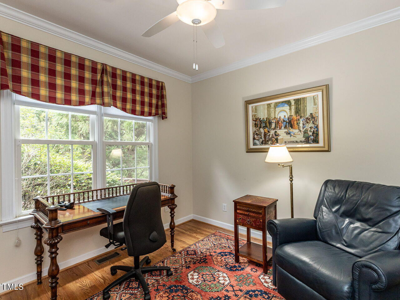 119 Oldefield Lane Garner, NC 27529 - Photo 20 of 38 a living room with furniture and a floor to ceiling window