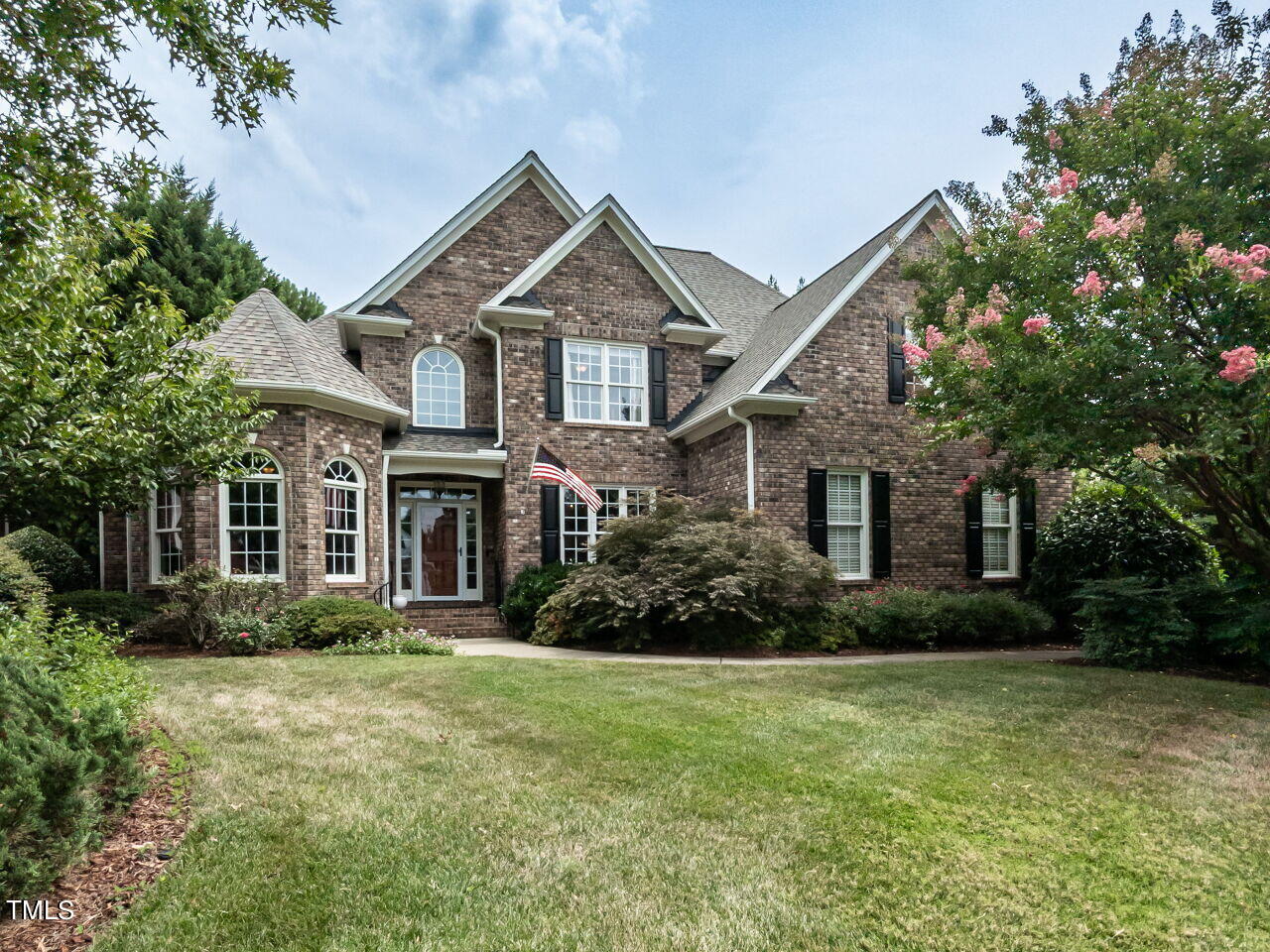 119 Oldefield Lane Garner, NC 27529 - Photo 2 of 38 a front view of a house with a yard