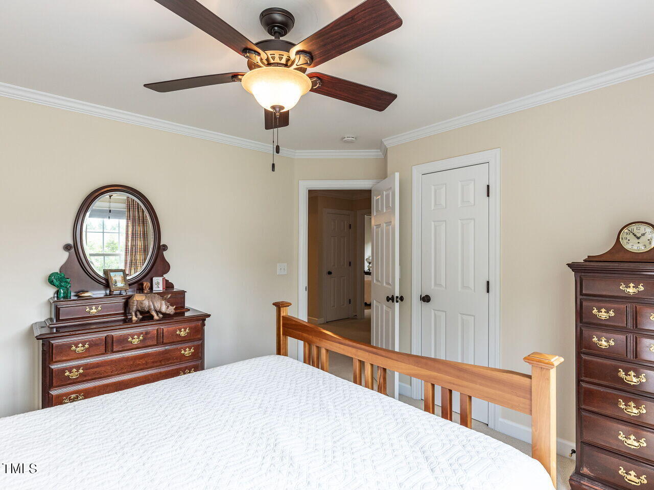 119 Oldefield Lane Garner, NC 27529 - Photo 25 of 38 a bedroom with furniture and a window