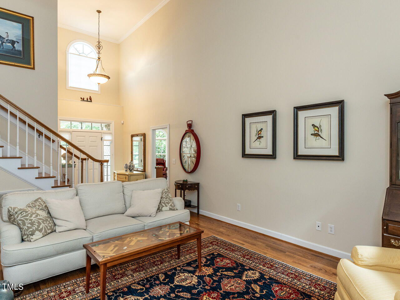 119 Oldefield Lane Garner, NC 27529 - Photo 9 of 38 a living room with furniture and a window
