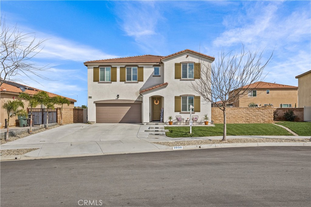 7036 Drysdale Street Riverside, CA 92503 - Photo 1 of 1 a view of white house with a yard