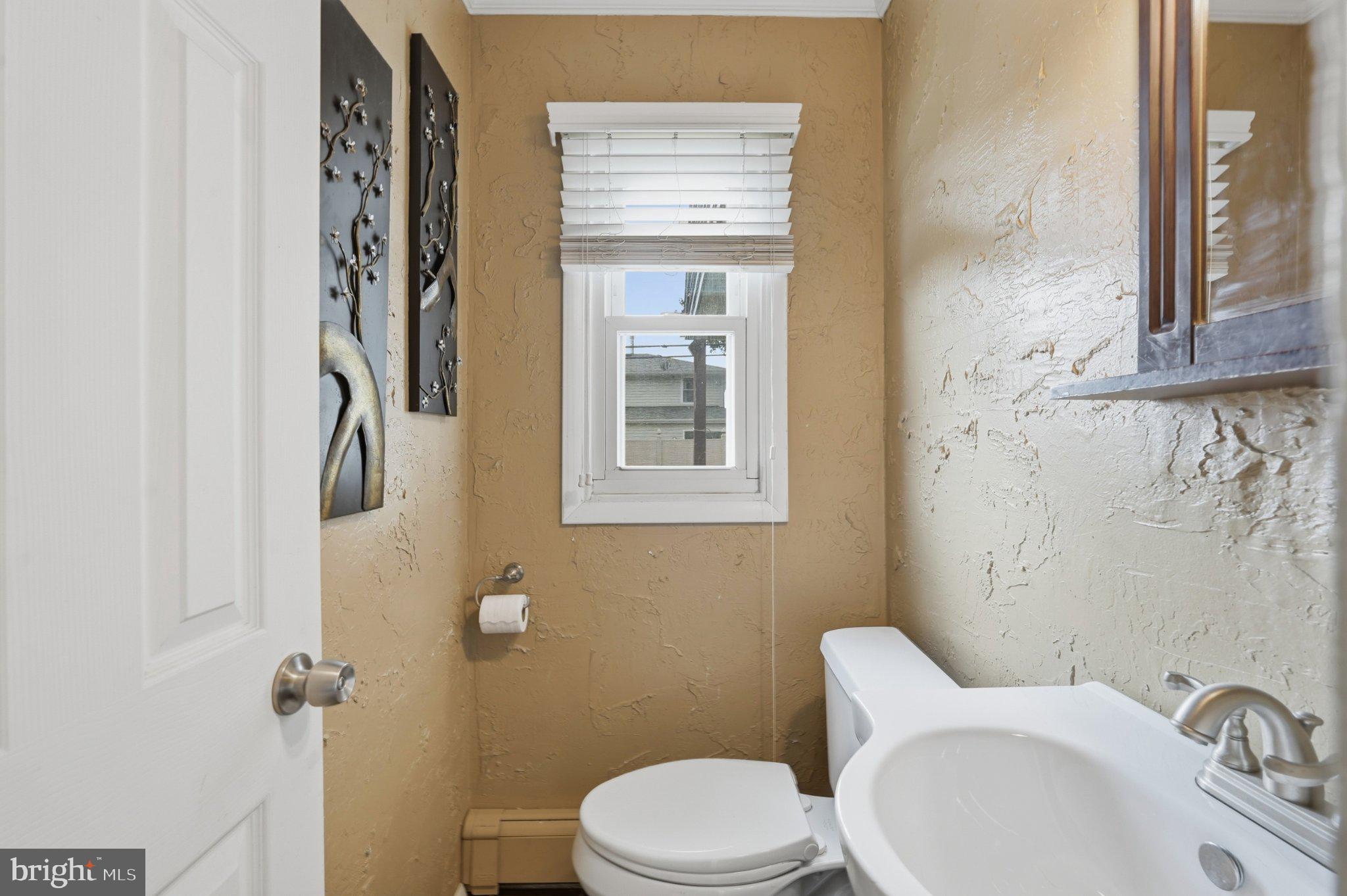 94 Terrace Road Levittown, PA 19056 - Photo 14 of 70 Charming half-bath with natural light.