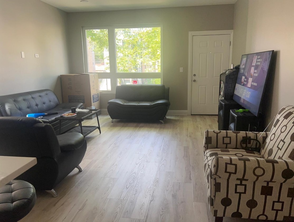 1051 North Springfield Avenue Chicago, IL 60651 - Photo 6 of 50 a living room with furniture and a window