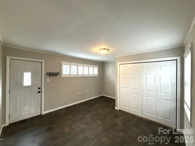 an empty room with windows