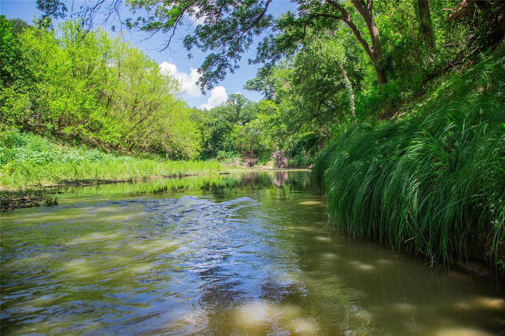 a view of outdoor space with deck and yard