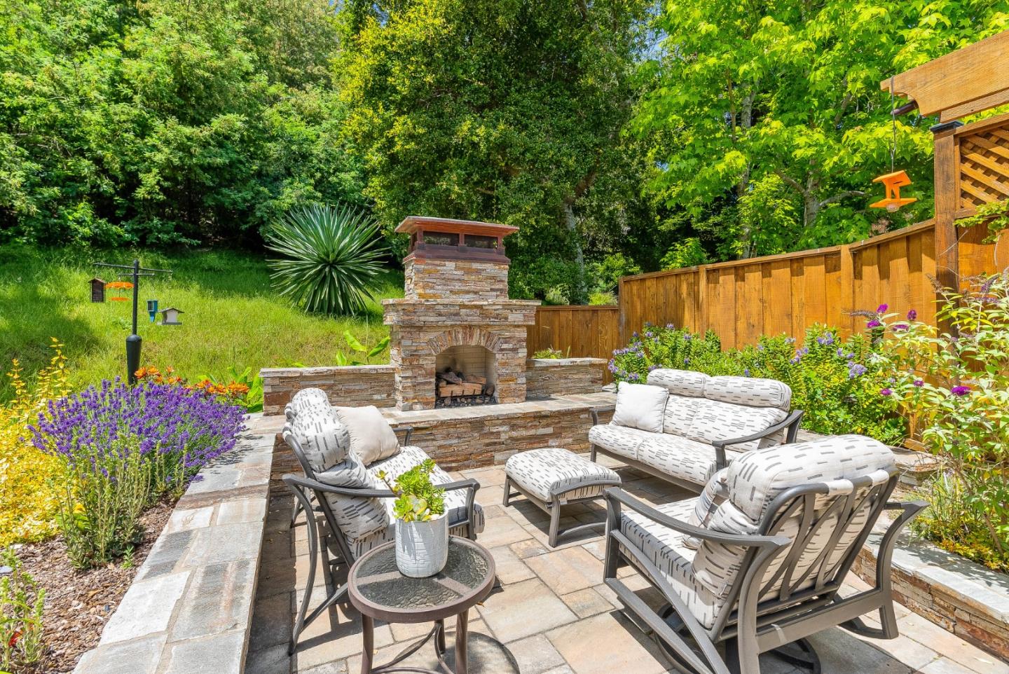 125 Chase Lane Aptos, CA 95003 - Photo 24 of 34 a view of a patio with couches table and chairs and potted plants