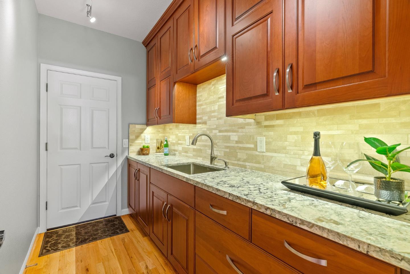 125 Chase Lane Aptos, CA 95003 - Photo 10 of 34 a bathroom with a sink and a mirror