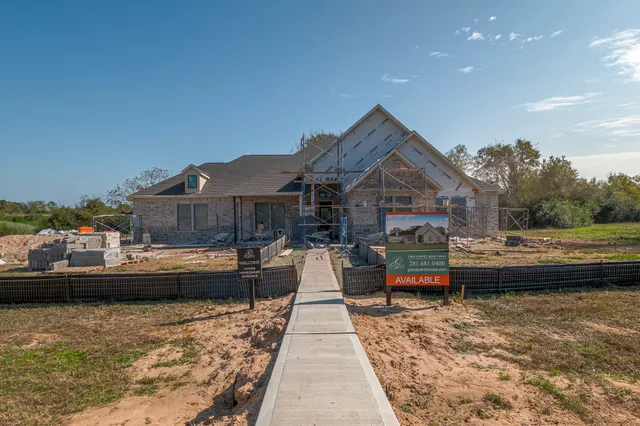 a view of swimming pool with outdoor seating