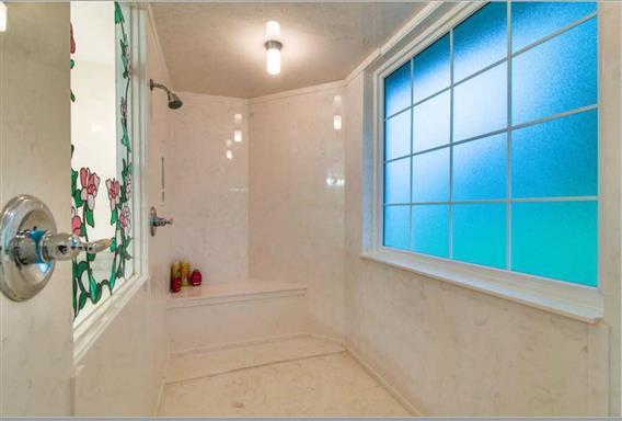 7768 Webster Road White House, TN 37188 - Photo 16 of 30 a bathroom with a bathtub and shower