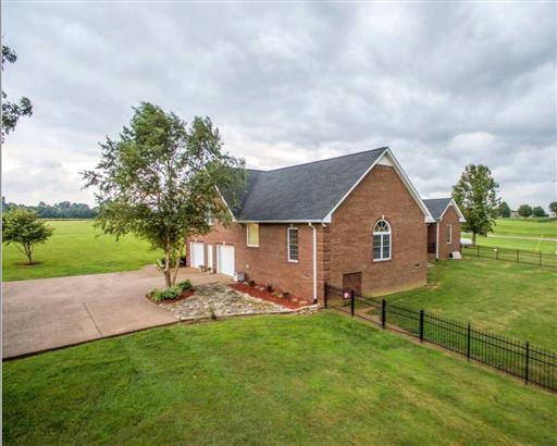 7768 Webster Road White House, TN 37188 - Photo 28 of 30 a view of a house with backyard and garden