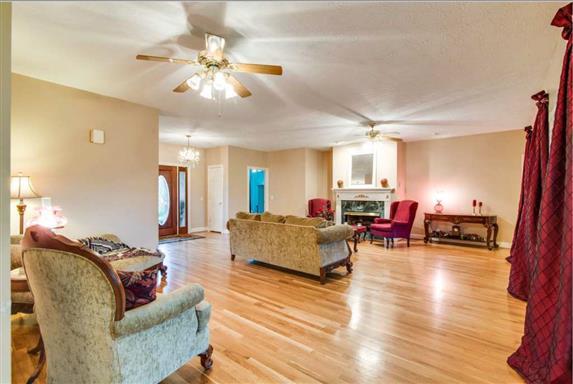 7768 Webster Road White House, TN 37188 - Photo 7 of 30 a living room with furniture and wooden floor