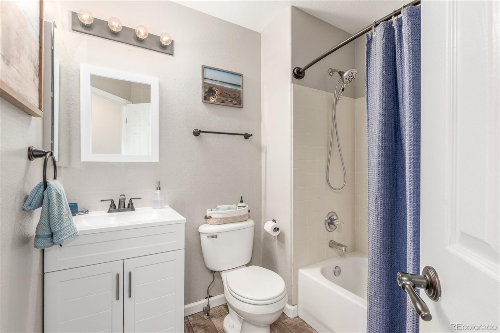 4864 Parsons Way Castle Rock, CO 80104 - Photo 21 of 50 a bathroom with a sink toilet and shower