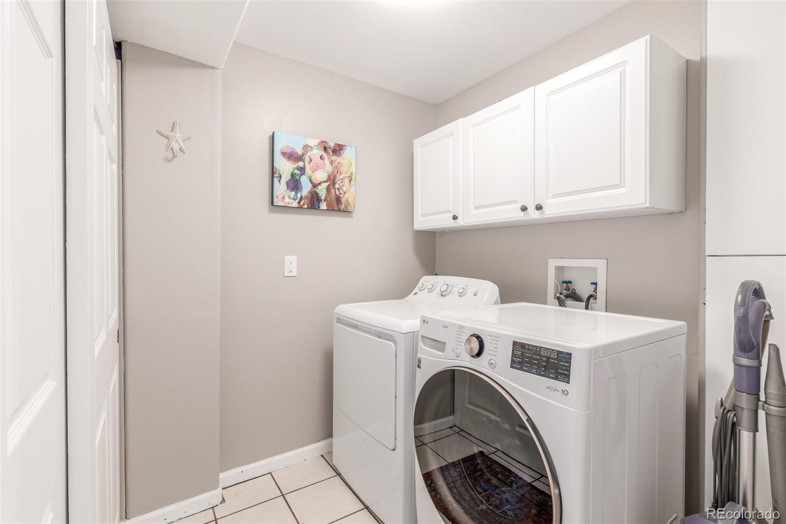 4864 Parsons Way Castle Rock, CO 80104 - Photo 27 of 50 a utility room with dryer and washer