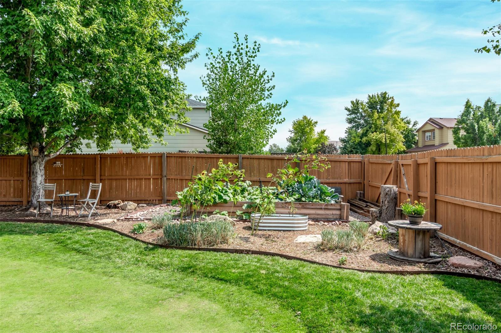 4864 Parsons Way Castle Rock, CO 80104 - Photo 34 of 50 a garden view with a seating space