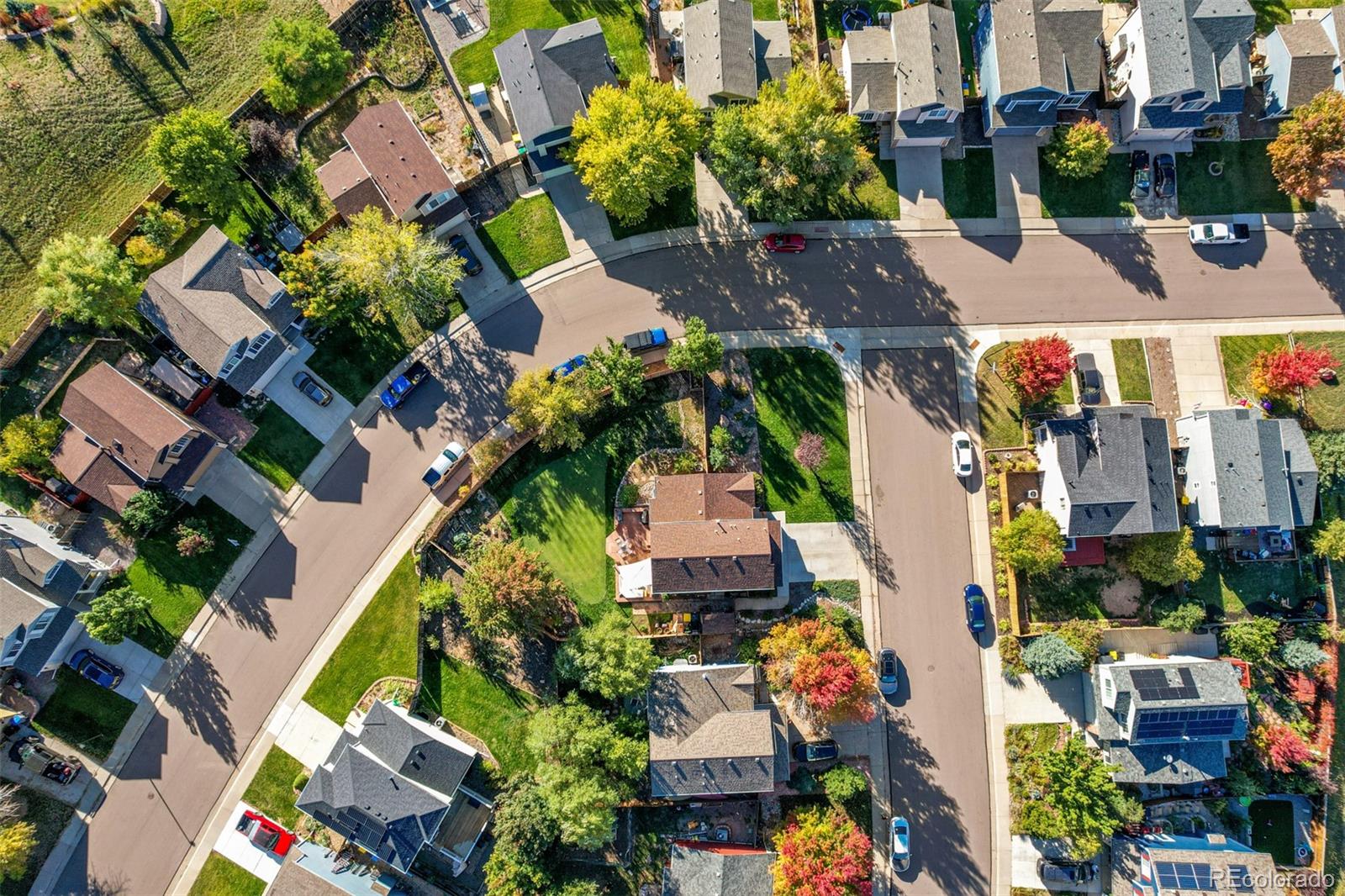 4864 Parsons Way Castle Rock, CO 80104 - Photo 45 of 50 an aerial view of multiple houses with yard