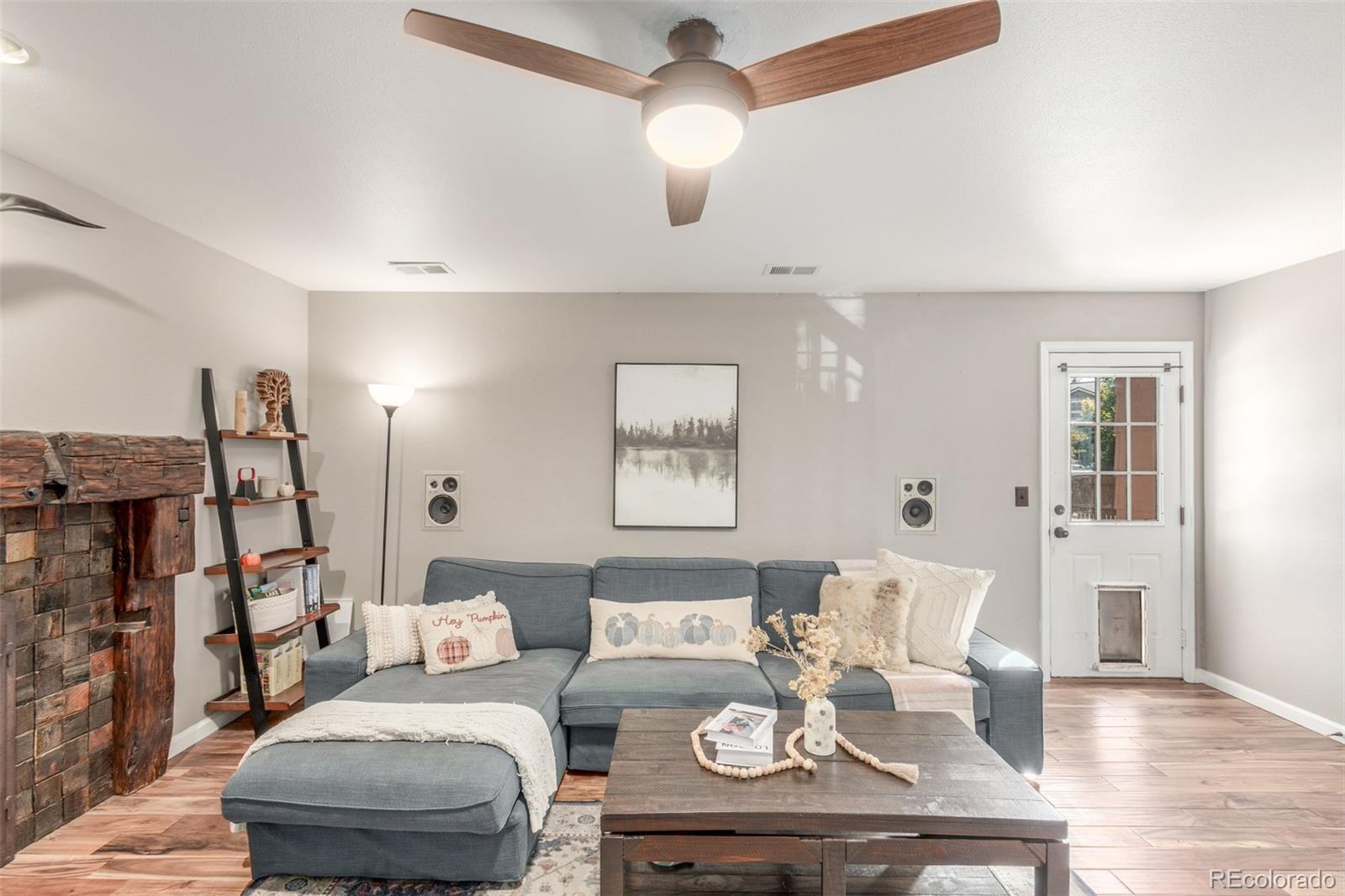 4864 Parsons Way Castle Rock, CO 80104 - Photo 10 of 50 a living room with furniture and a wooden floor