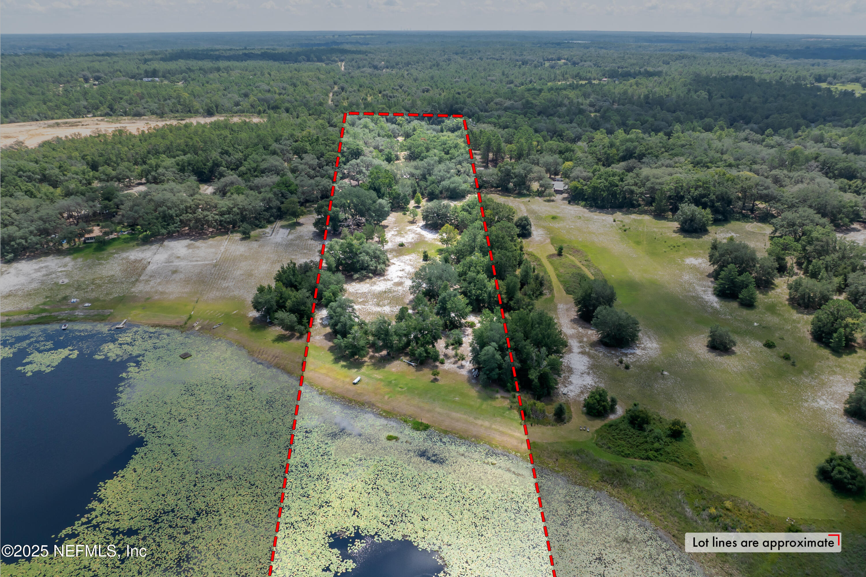 8048 County Line Road Melrose, FL 32666 - Photo 2 of 40 an aerial view of a houses with a yard
