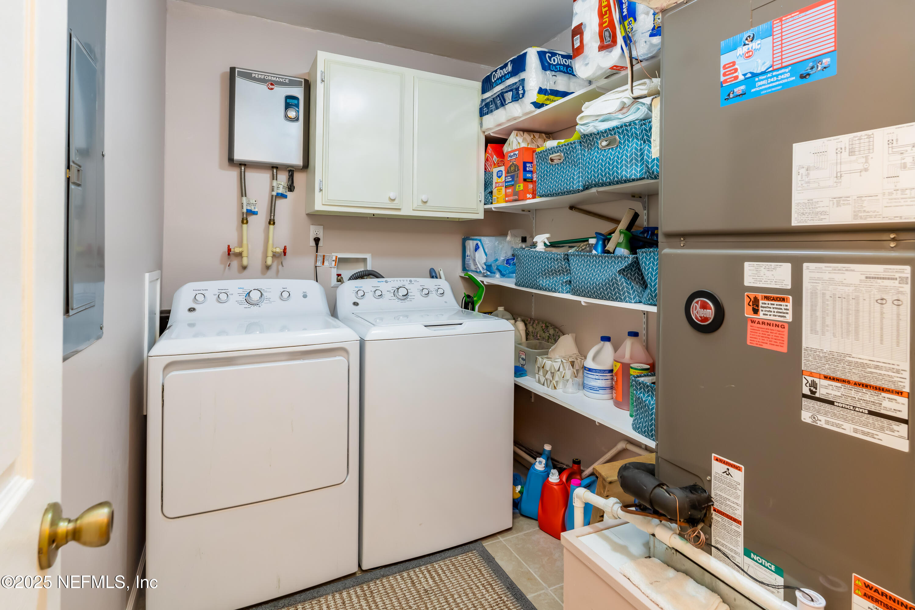 8048 County Line Road Melrose, FL 32666 - Photo 23 of 40 a utility room with dryer and washer