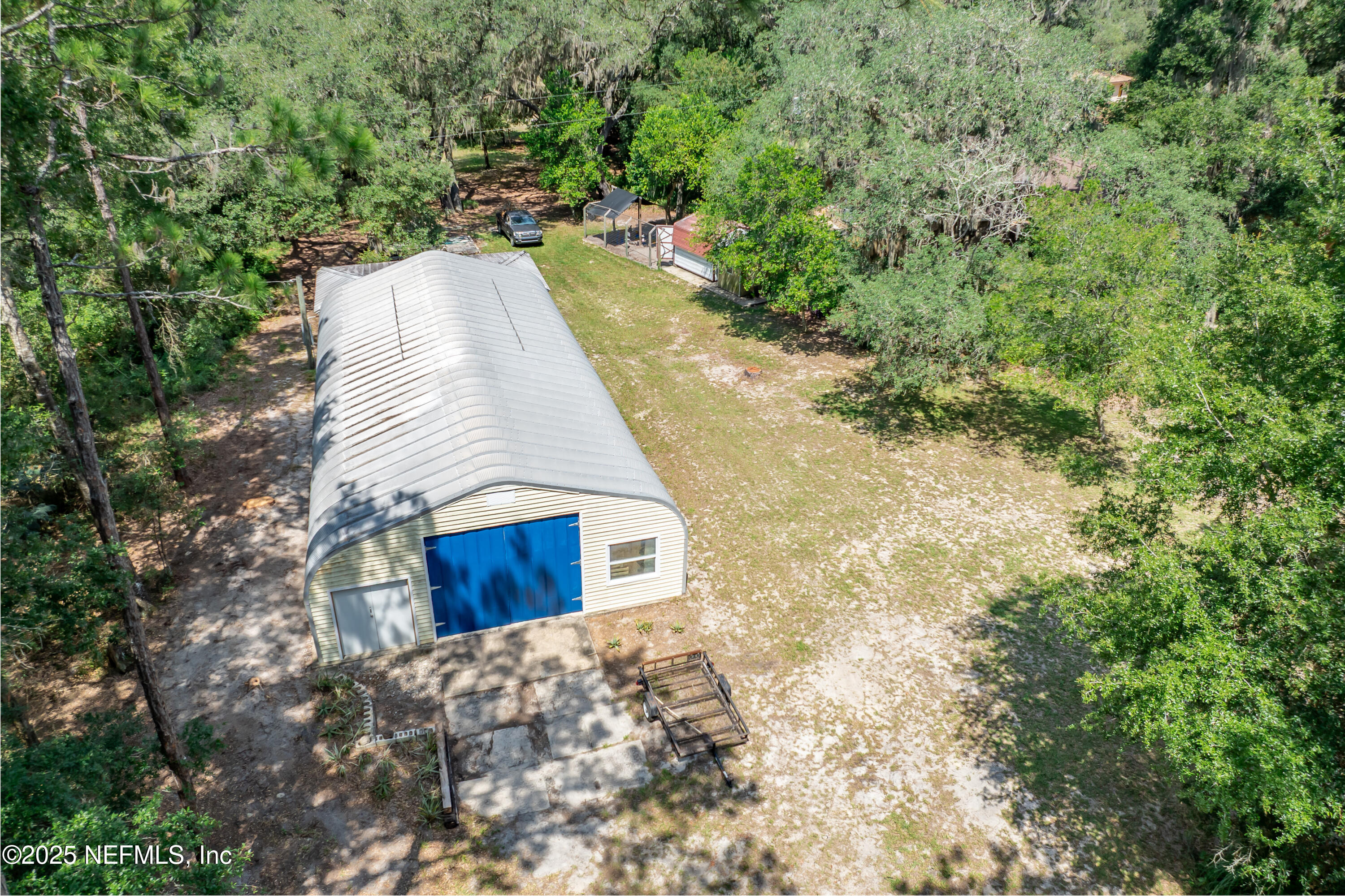 8048 County Line Road Melrose, FL 32666 - Photo 36 of 40 a view of a dry yard with large trees